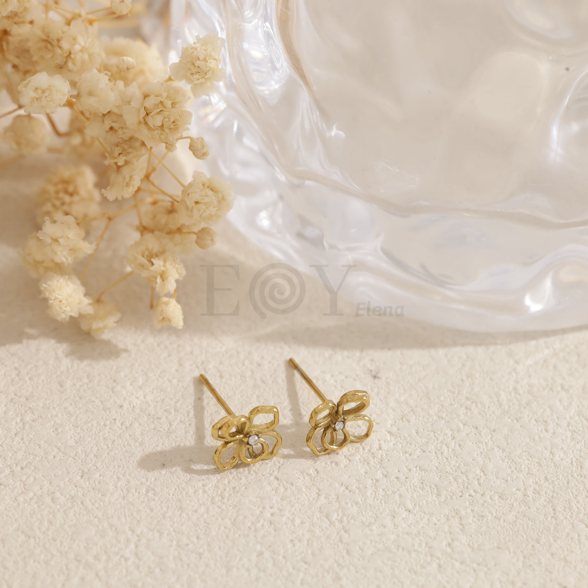 Pendientes flor circonita acero