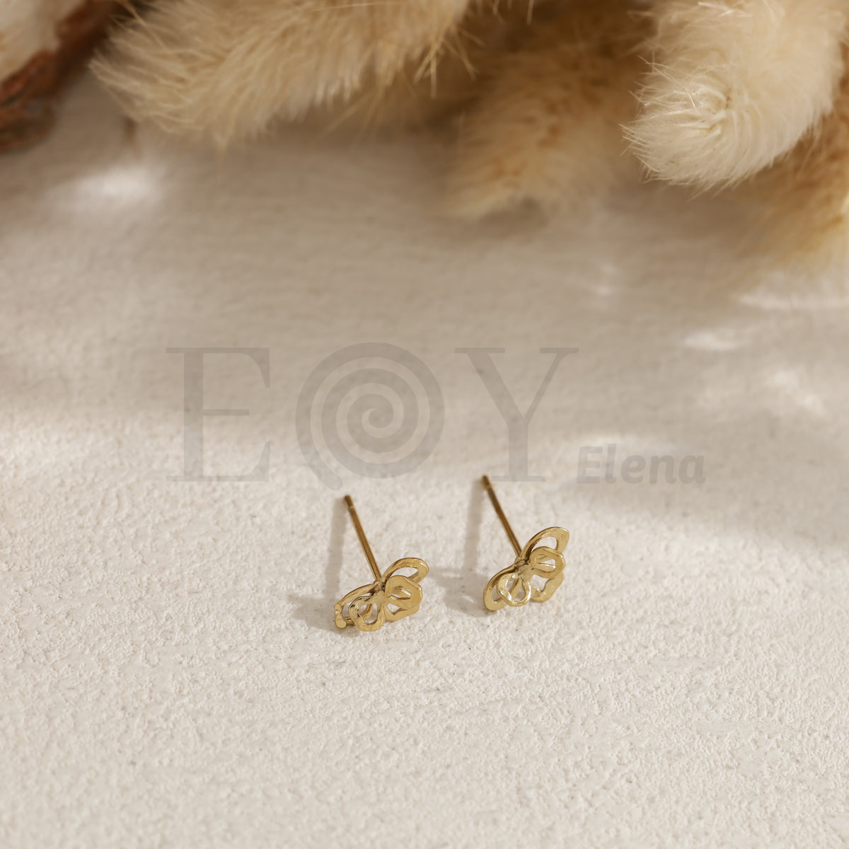 Pendientes media flor acero
