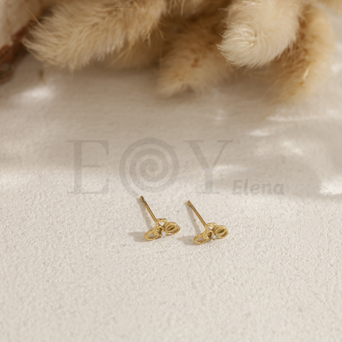 Pendientes media flor acero