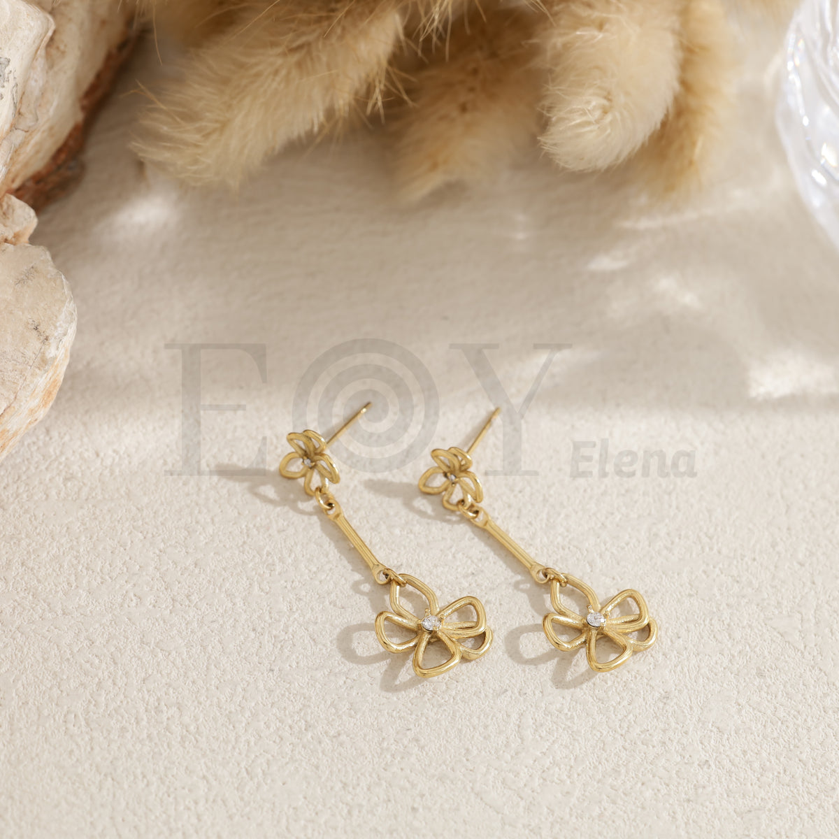 Pendientes largos doble flor acero