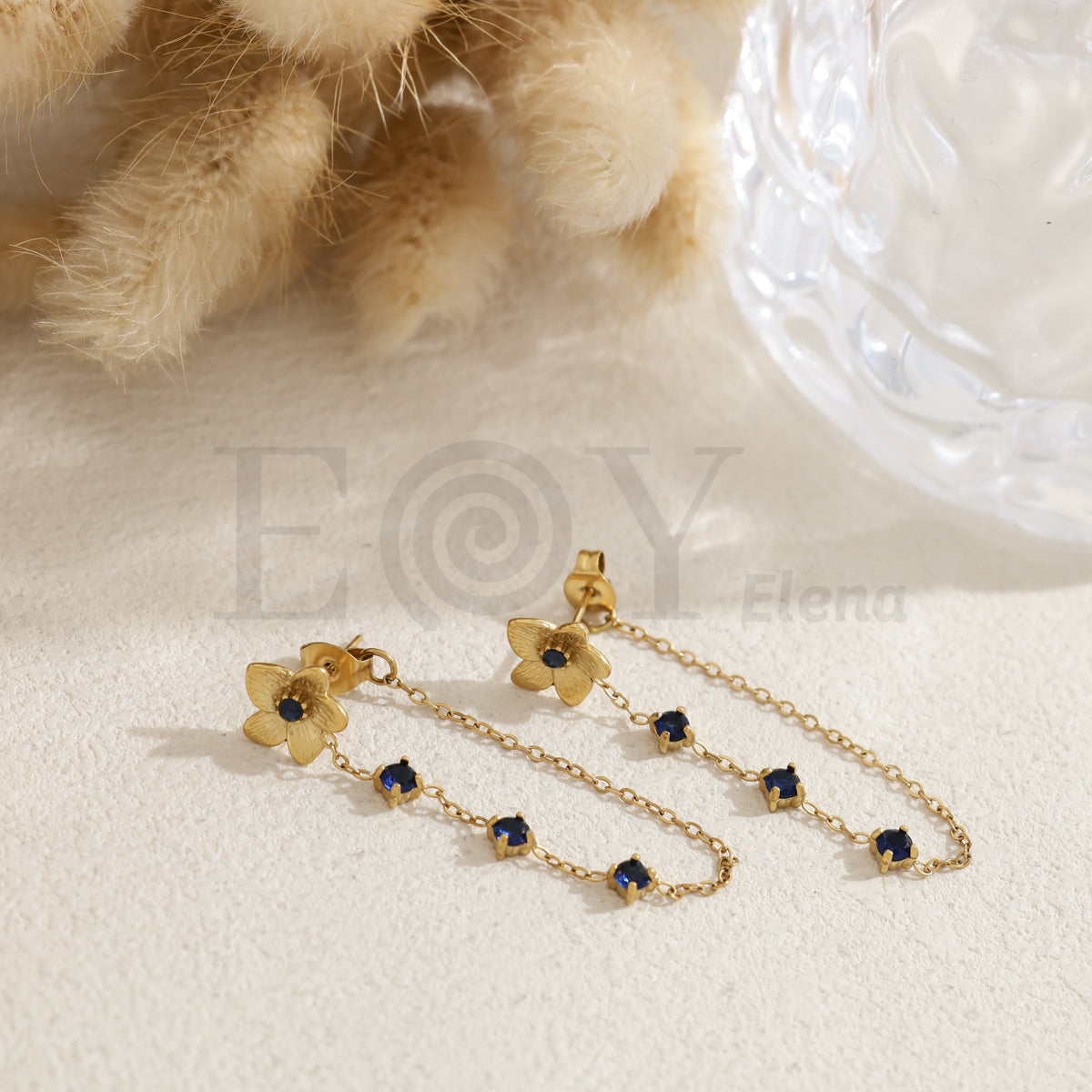 Pendientes flor con cadena piedras color acero