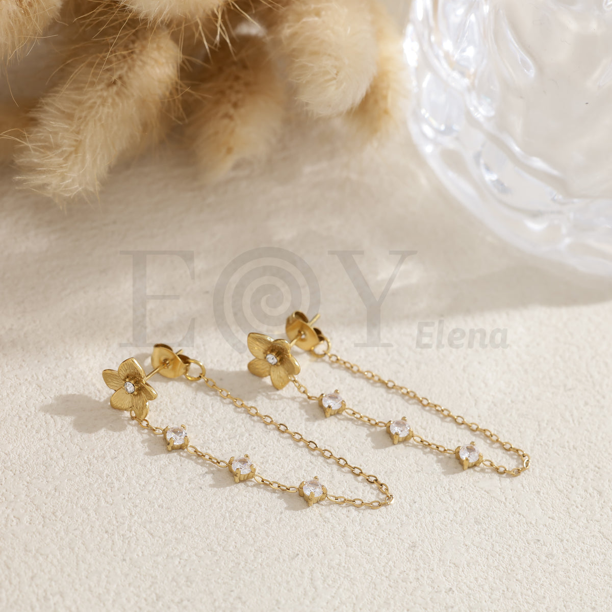 Pendientes flor con cadena piedras color acero