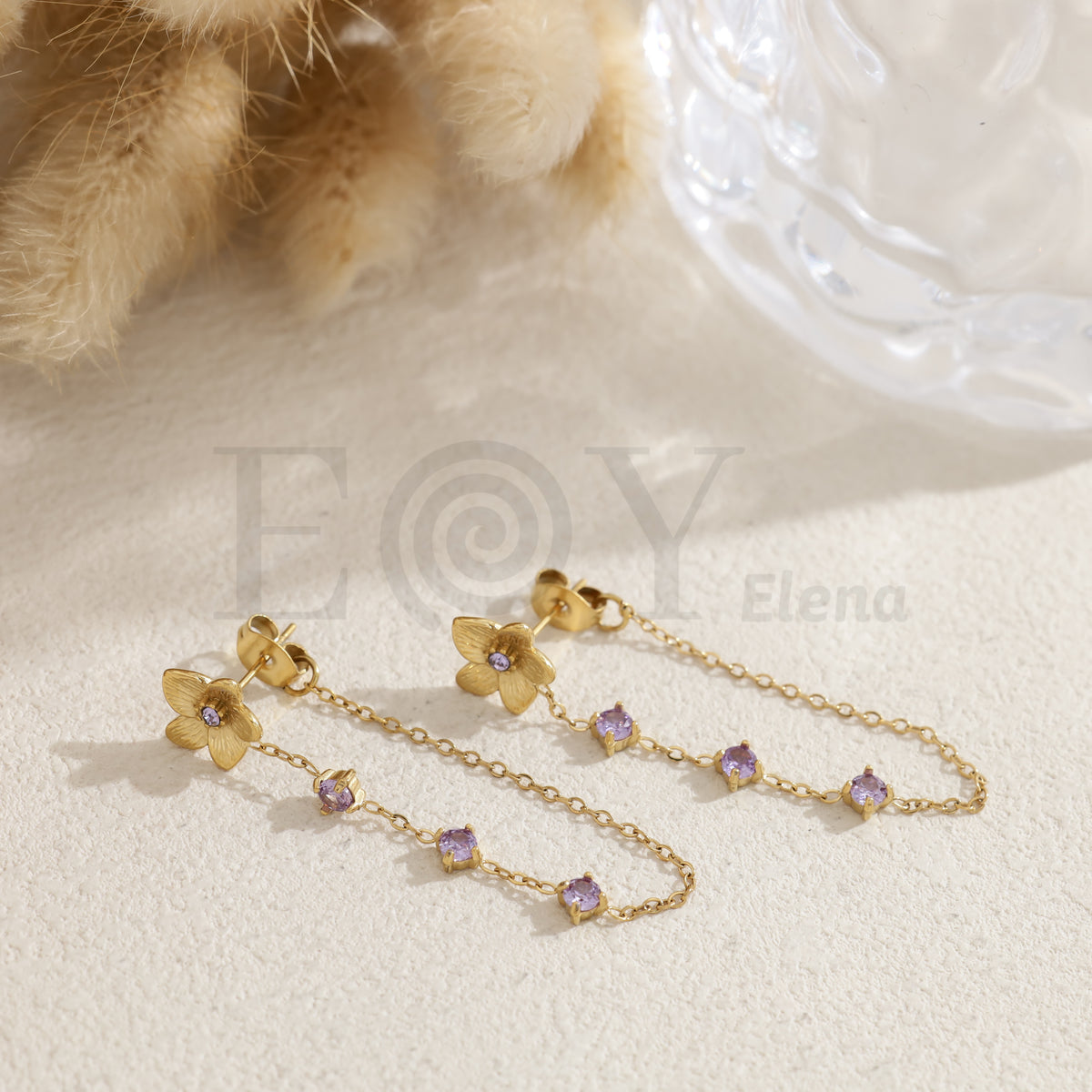 Pendientes flor con cadena piedras color acero