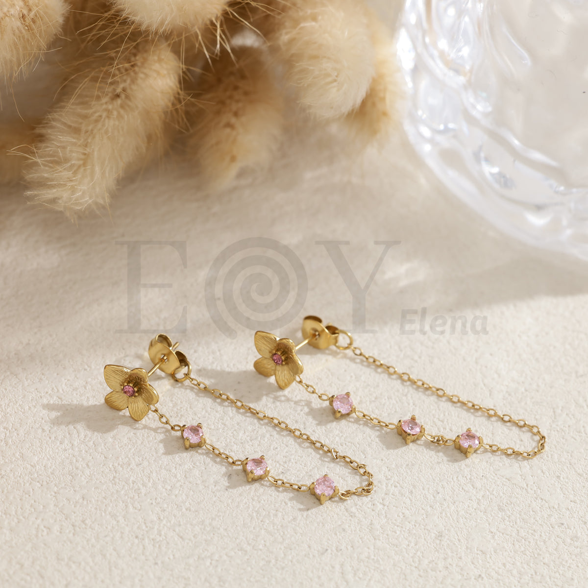 Pendientes flor con cadena piedras color acero