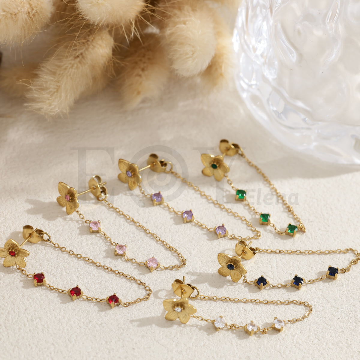 Pendientes flor con cadena piedras color acero