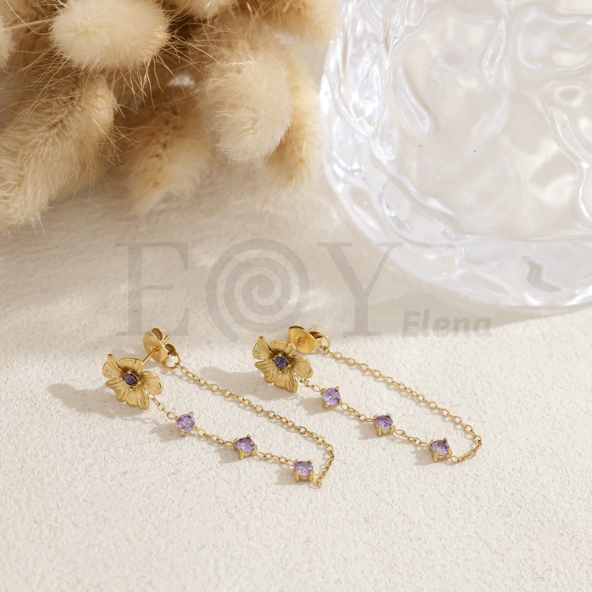 Pendientes flor con circonitas colores acero