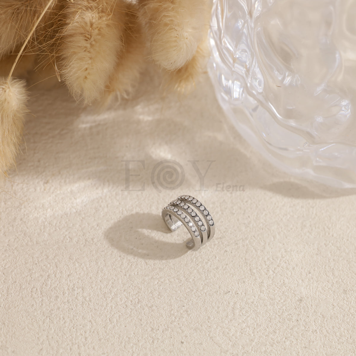 Brazalete de oreja triple fila circonitas acero