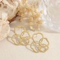Pendientes flor calada acero
