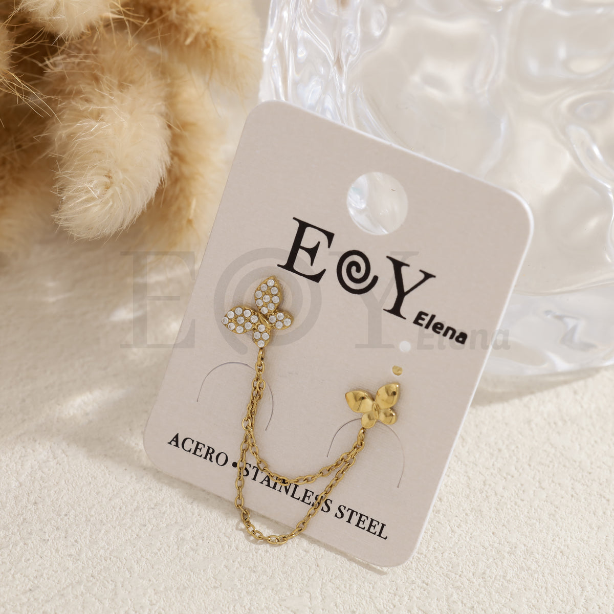 Pendientes doble agujero mariposa acero