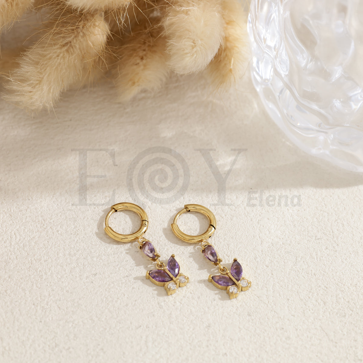 Pendientes de aro con mariposa color acero