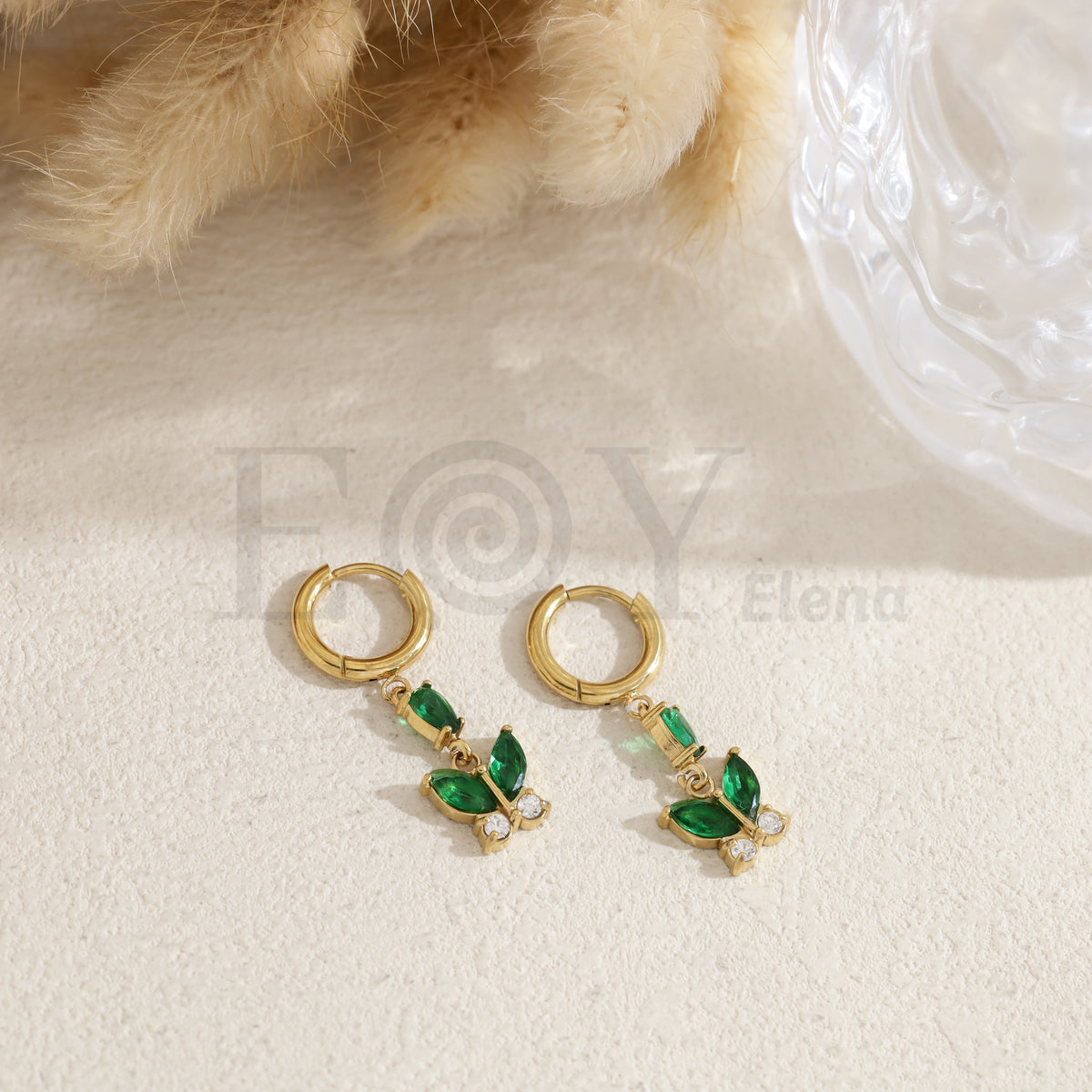 Pendientes de aro con mariposa color acero