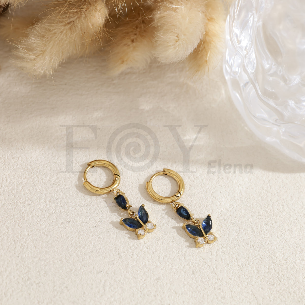Pendientes de aro con mariposa color acero