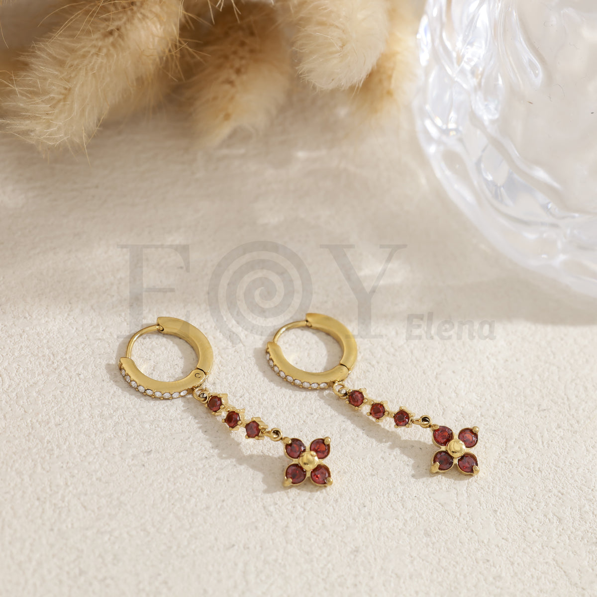 Pendientes de aro con flor acero