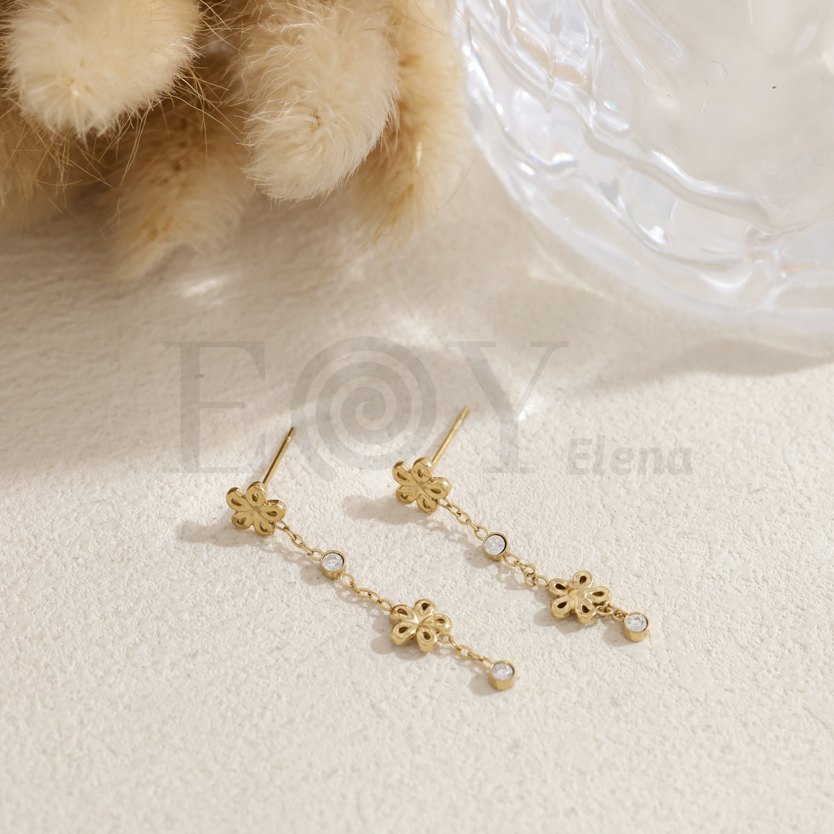 Pendientes flor y circonitas acero