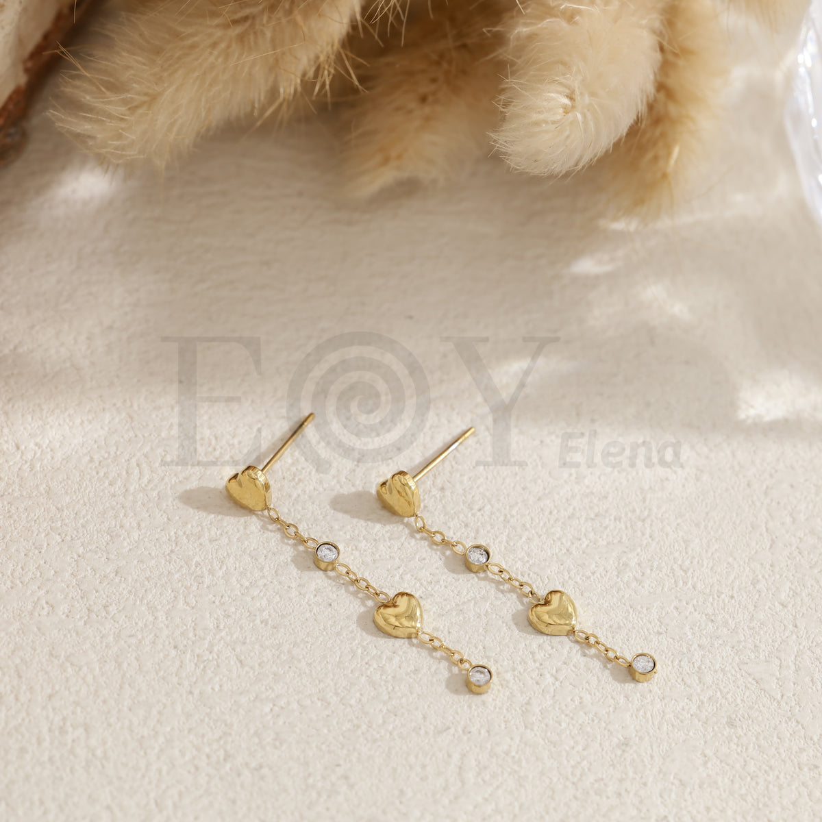 Pendientes corazones y circonitas acero