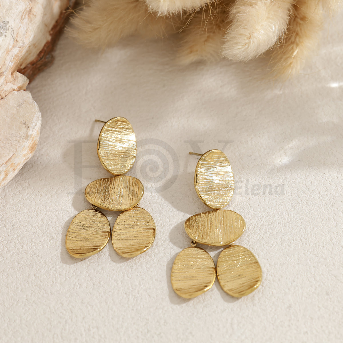 Pendientes formas ovaladas acero