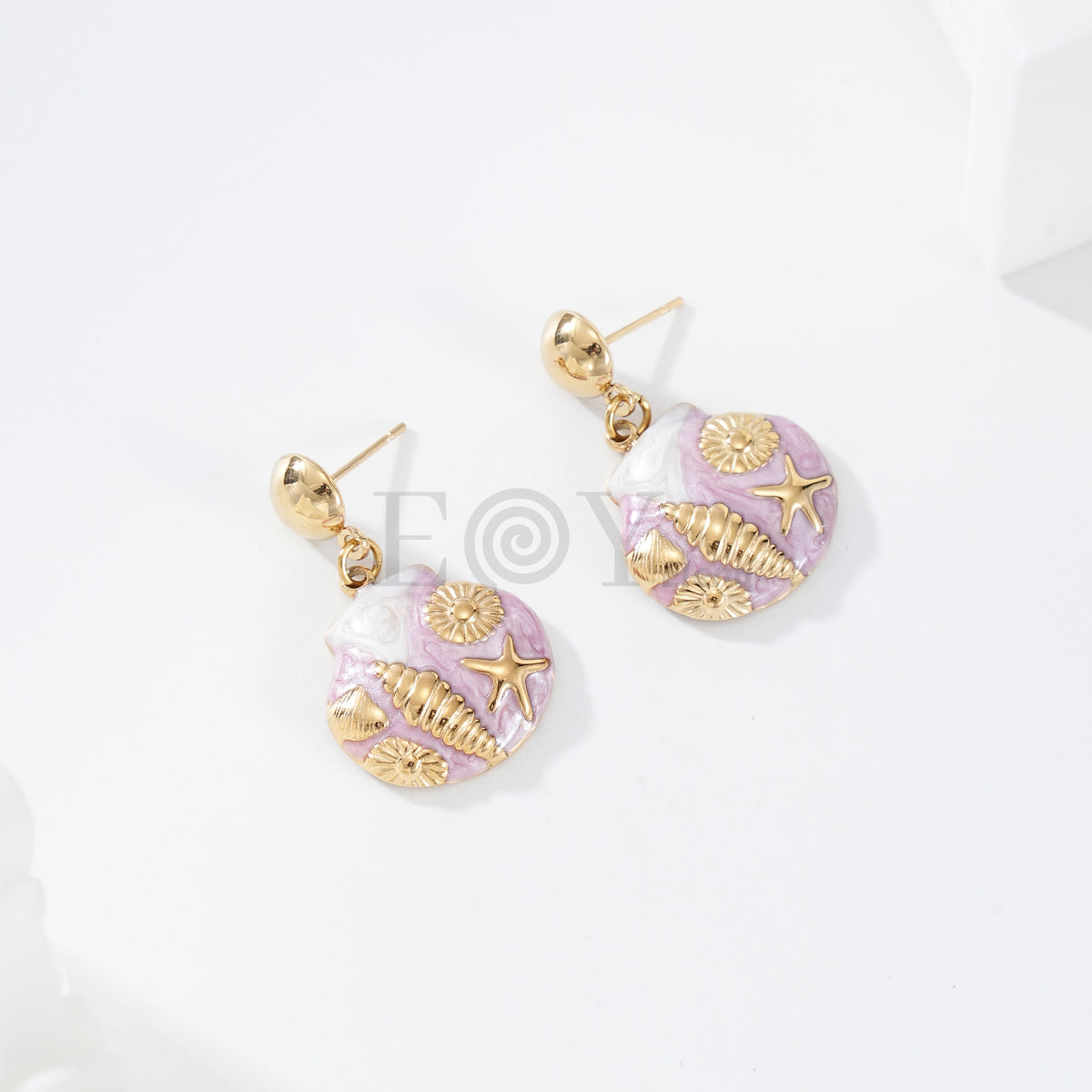 Pendientes concha con detalles marinos