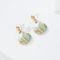 Pendientes concha con detalles marinos
