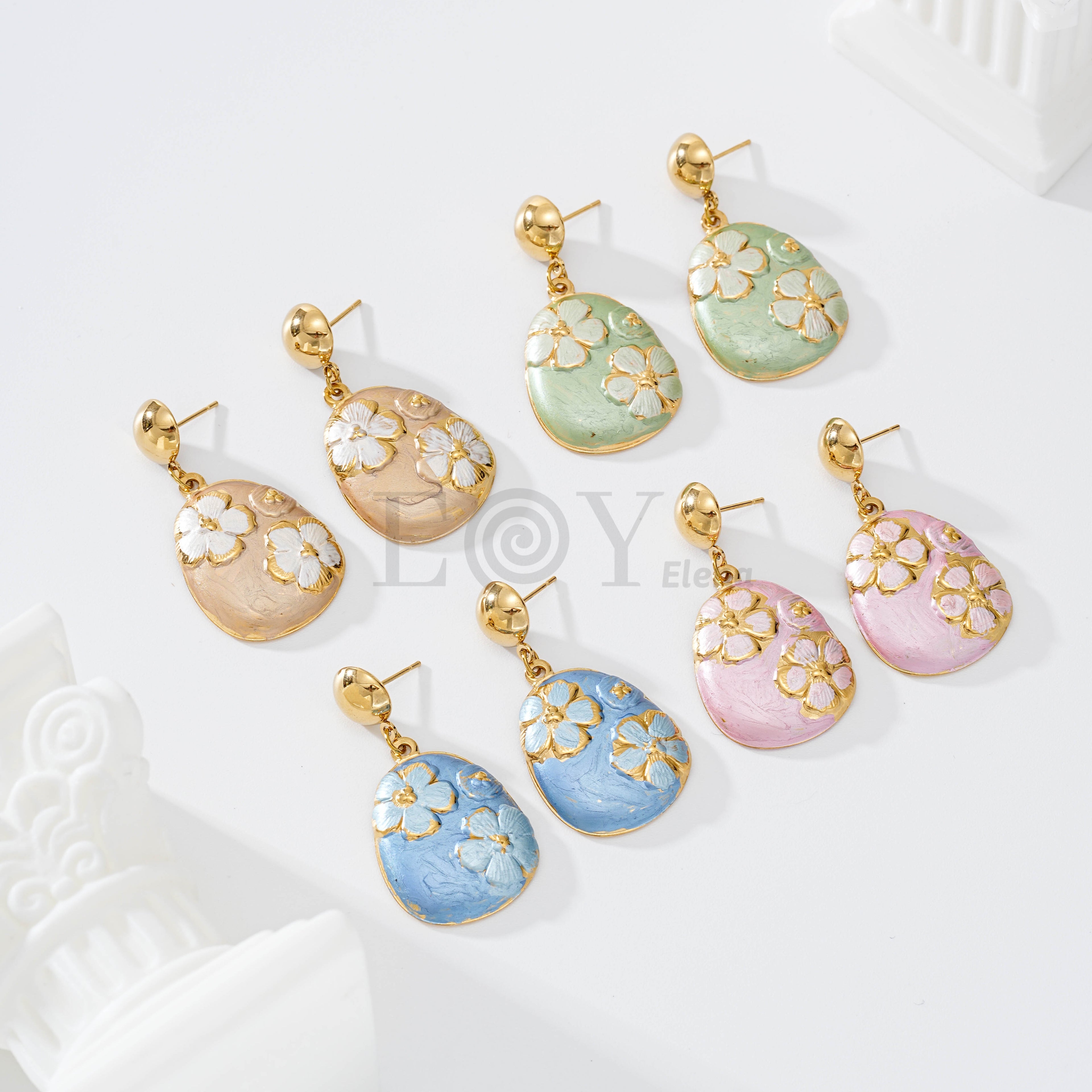 Pendientes con pieza decorada flor