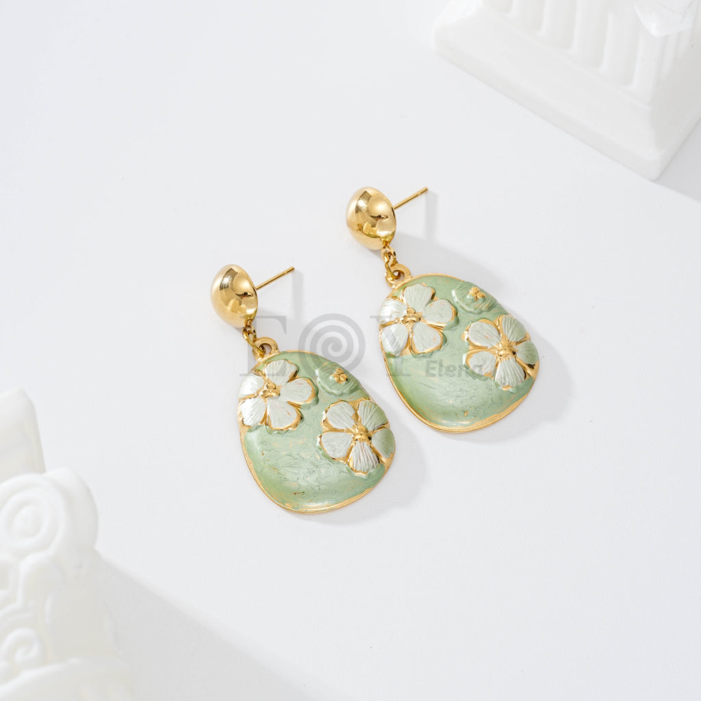 Pendientes con pieza decorada flor
