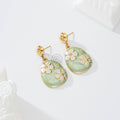 Pendientes con pieza decorada flor