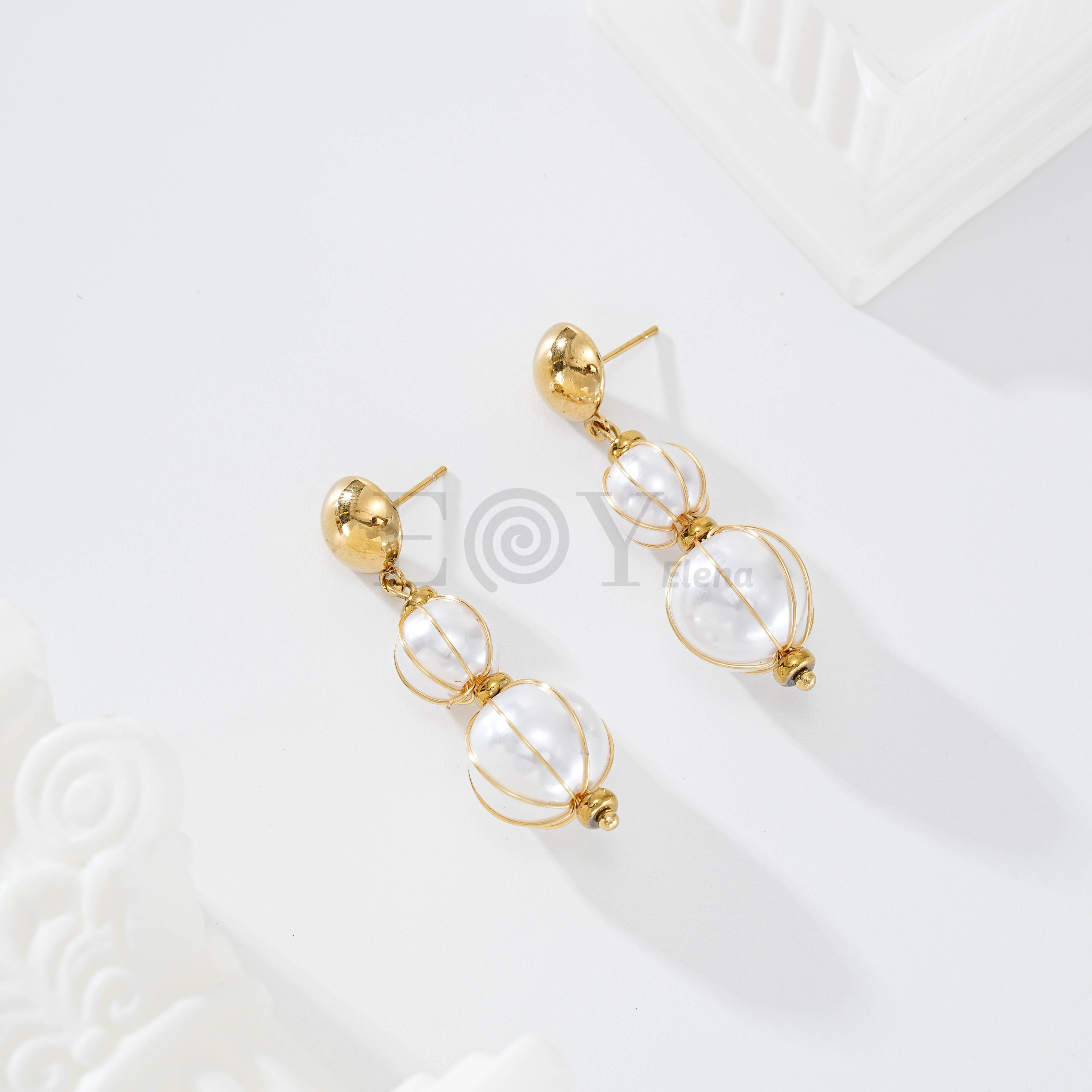 Pendientes doble perla
