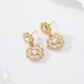 Pendientes doble flor con circonita central