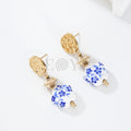 Pendientes chapa textura con piedra y estrellas azules