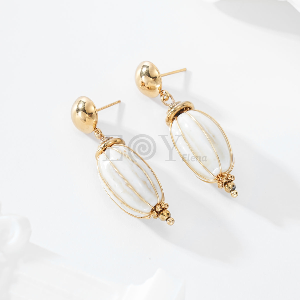 Pendientes con piedra alargada color