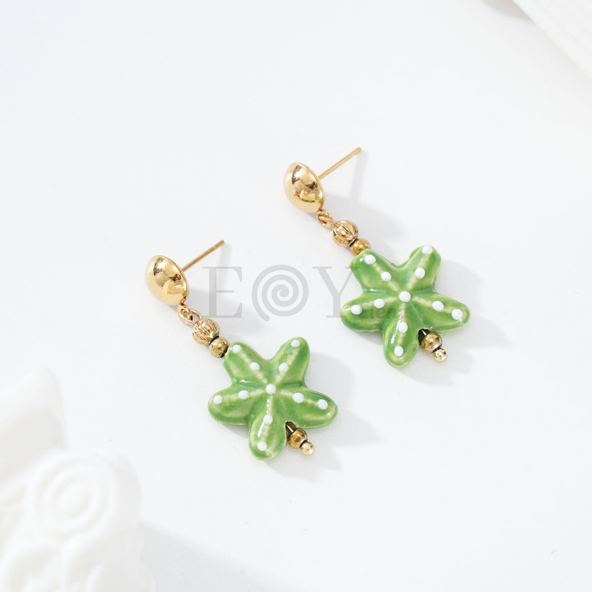 Pendientes colgante estrella mar color