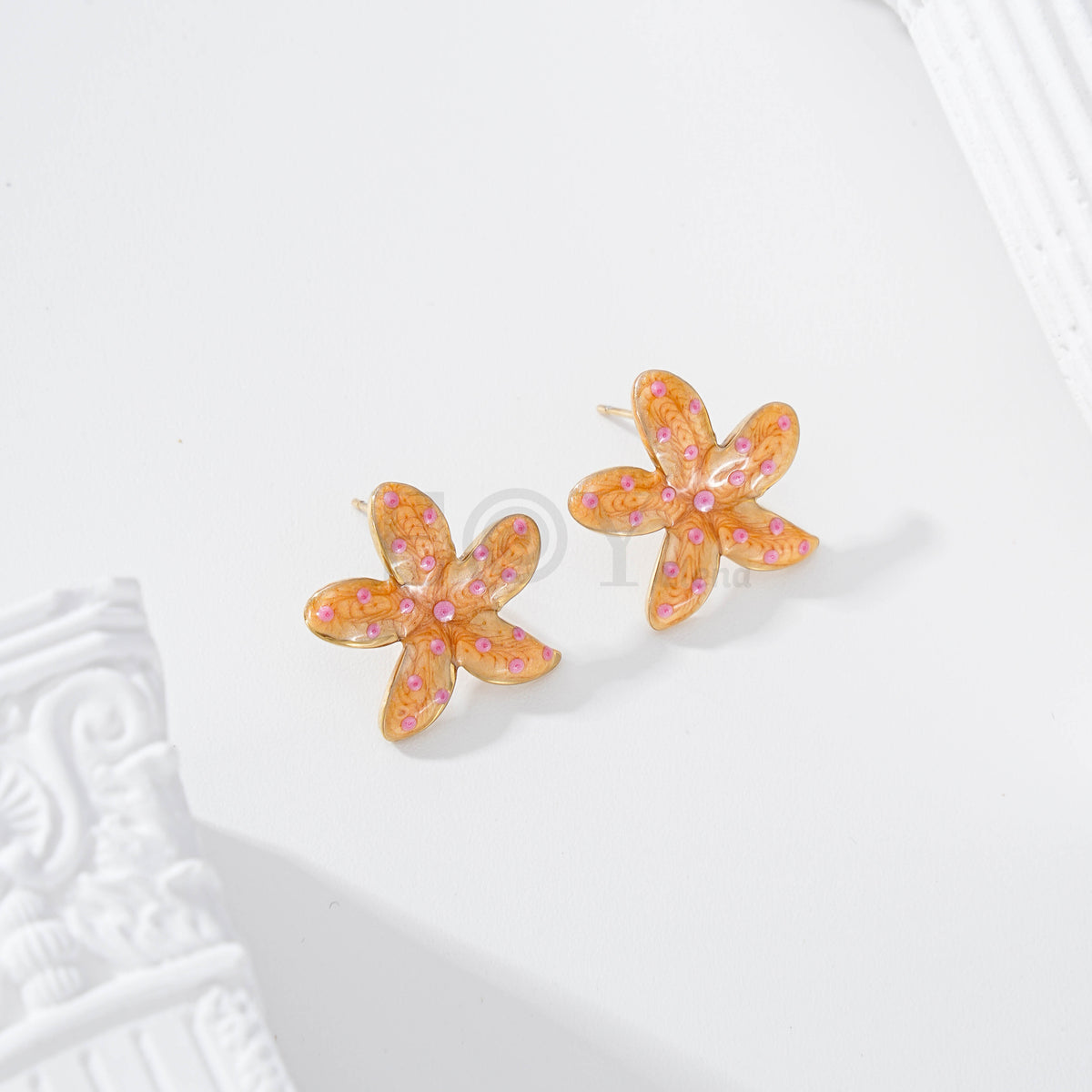 Pendientes flor color