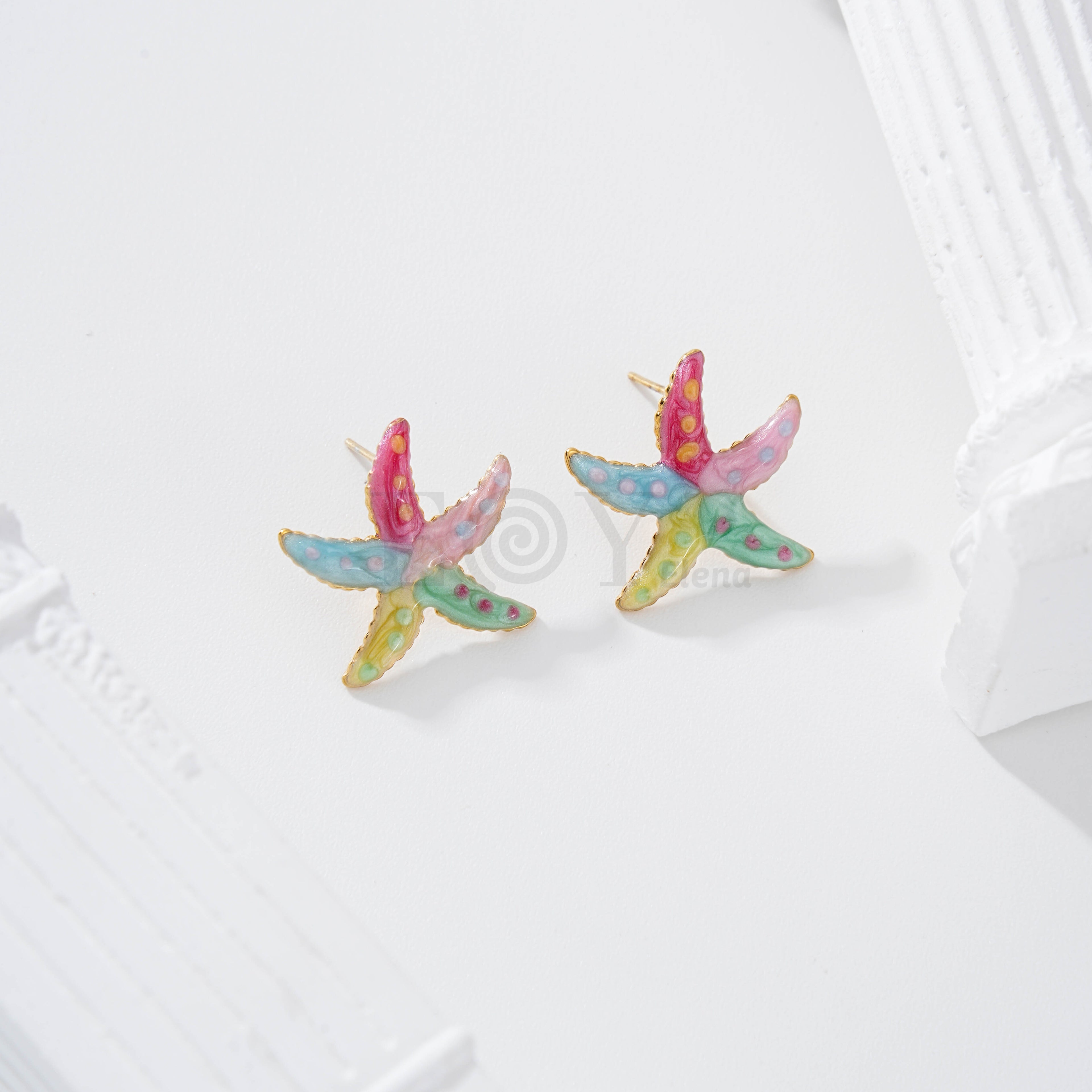 Pendientes estrella de mar color con lunares