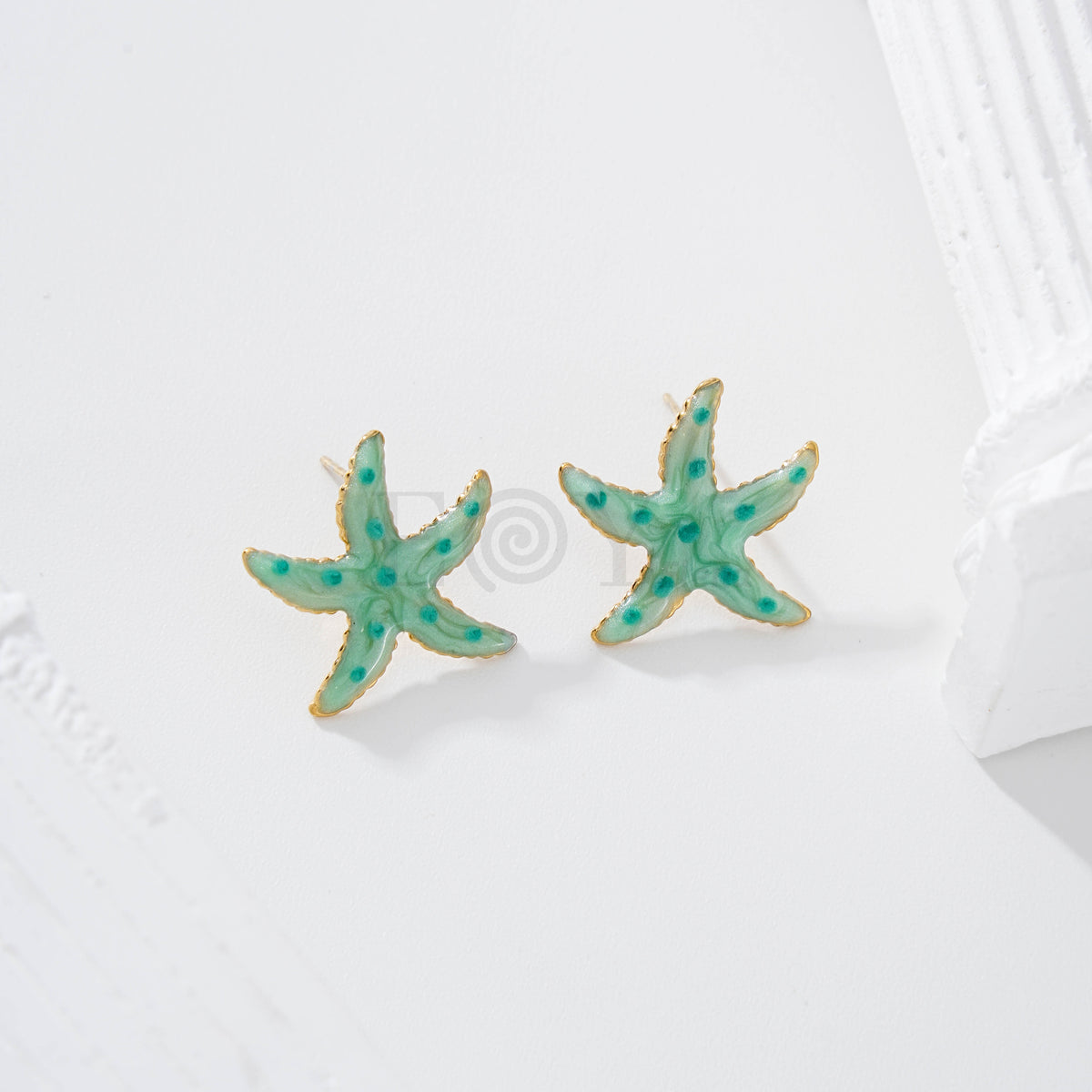 Pendientes estrella de mar color con lunares