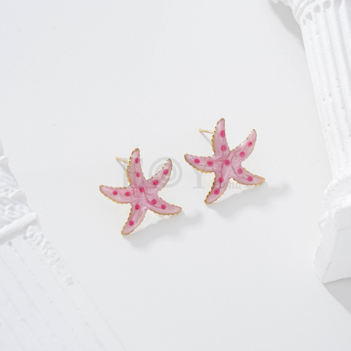 Pendientes estrella de mar color con lunares