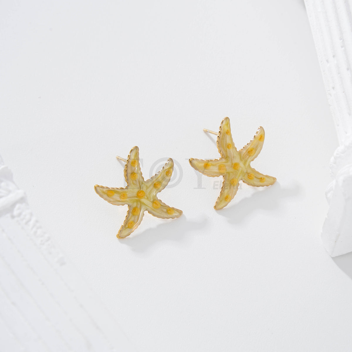 Pendientes estrella de mar color con lunares