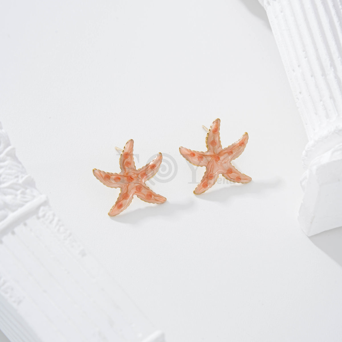 Pendientes estrella de mar color con lunares