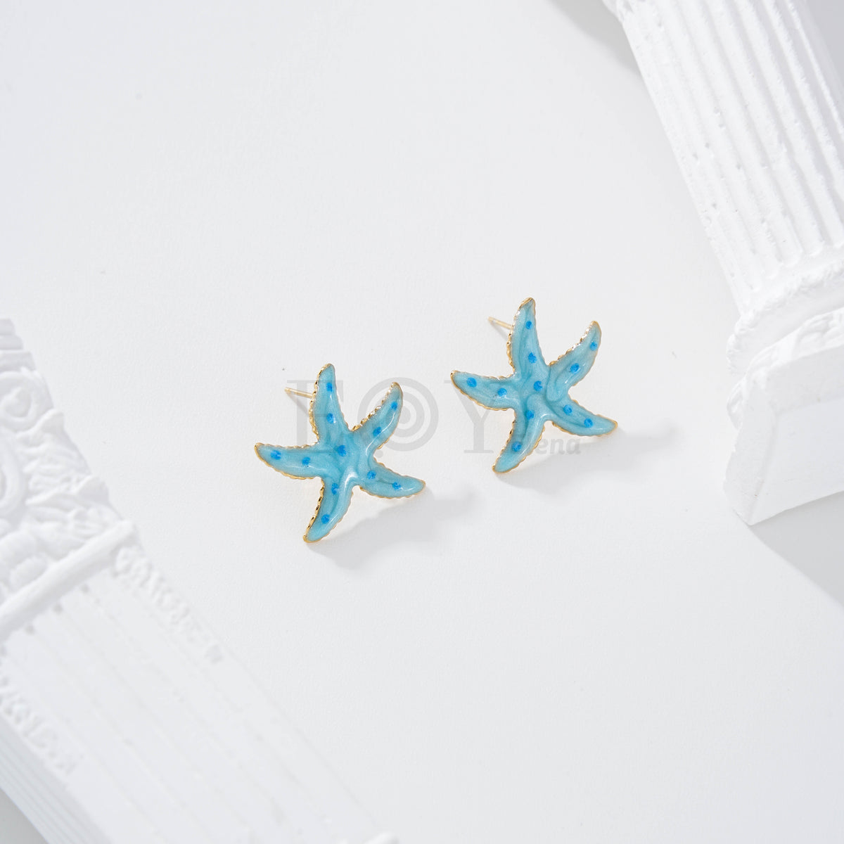 Pendientes estrella de mar color con lunares