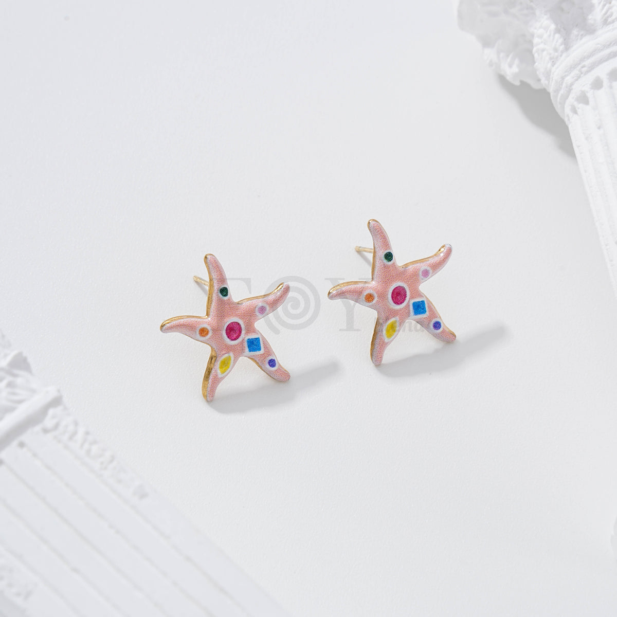 Pendientes estrella de mar con figuras geométricas
