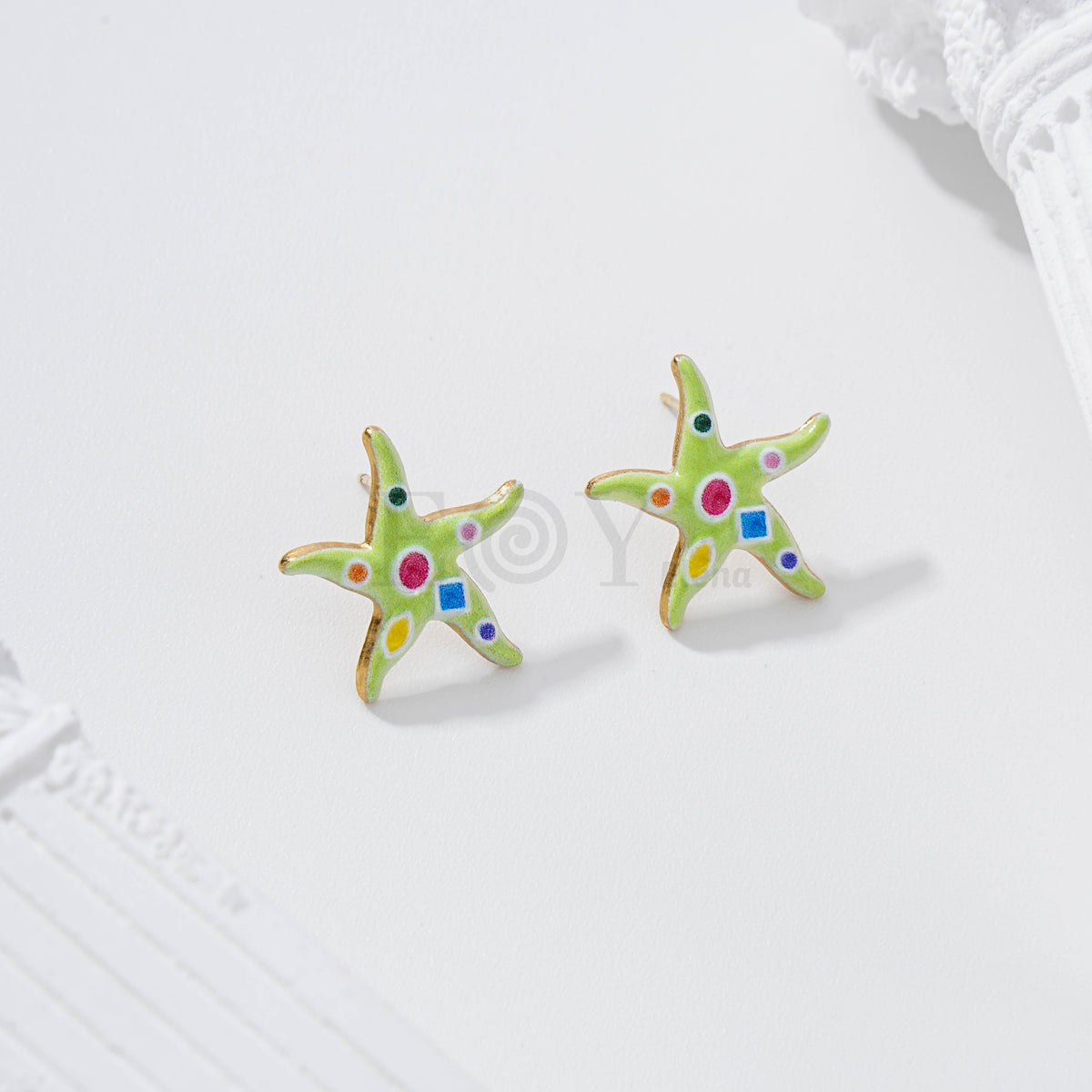 Pendientes estrella de mar con figuras geométricas