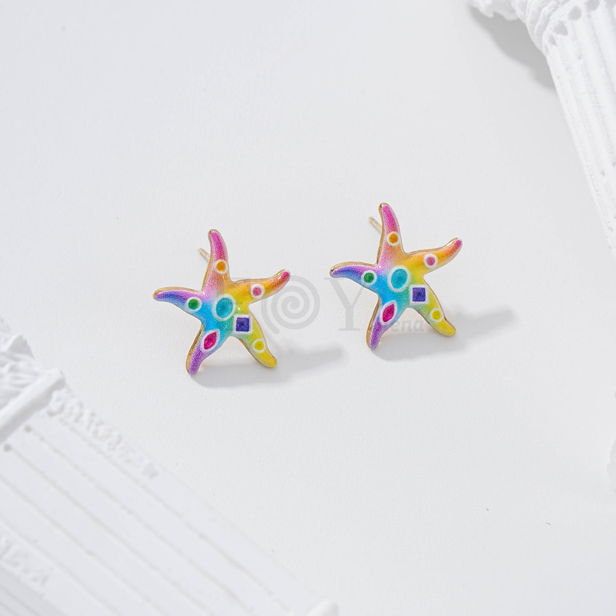 Pendientes estrella de mar con figuras geométricas
