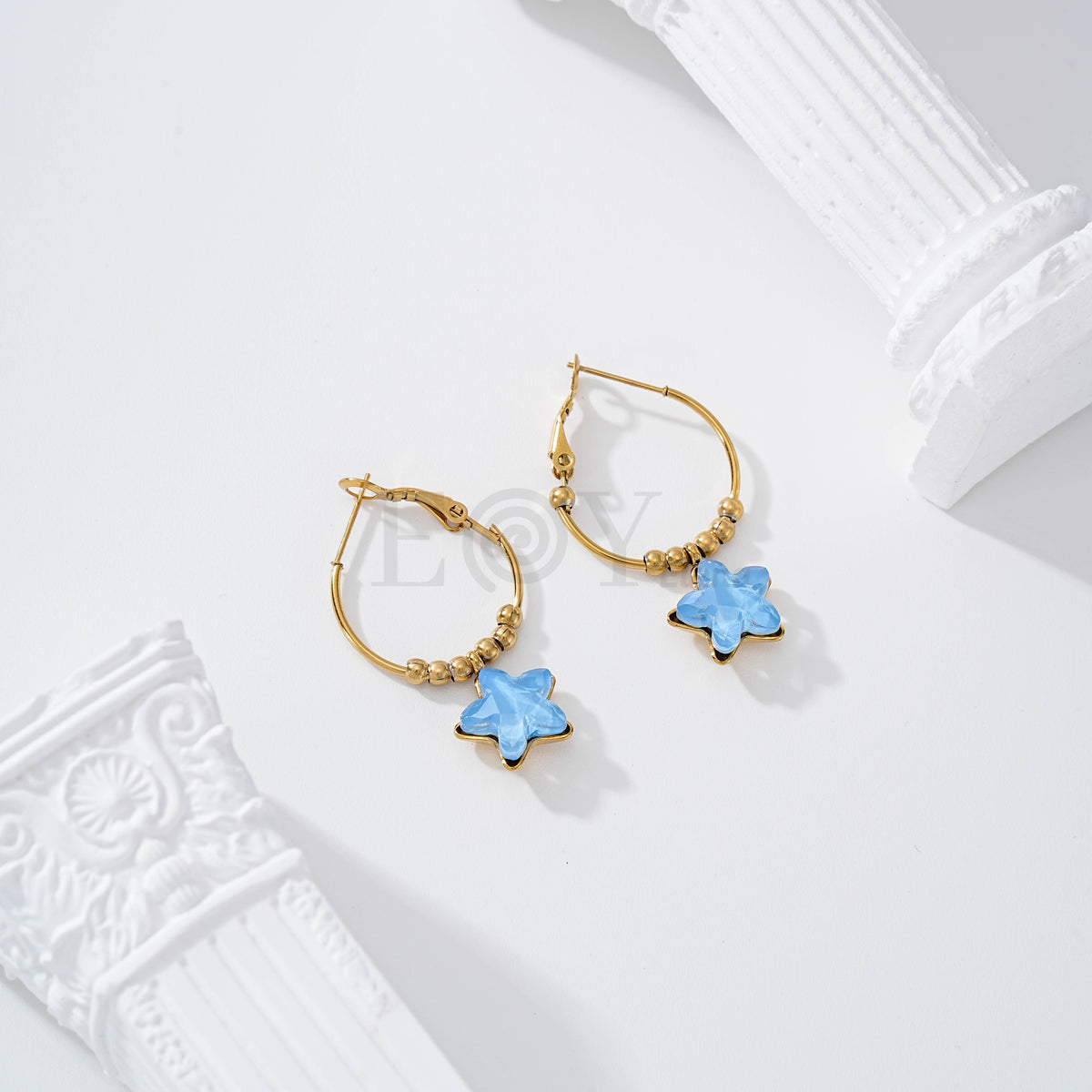 Pendientes aro con estrella piedra