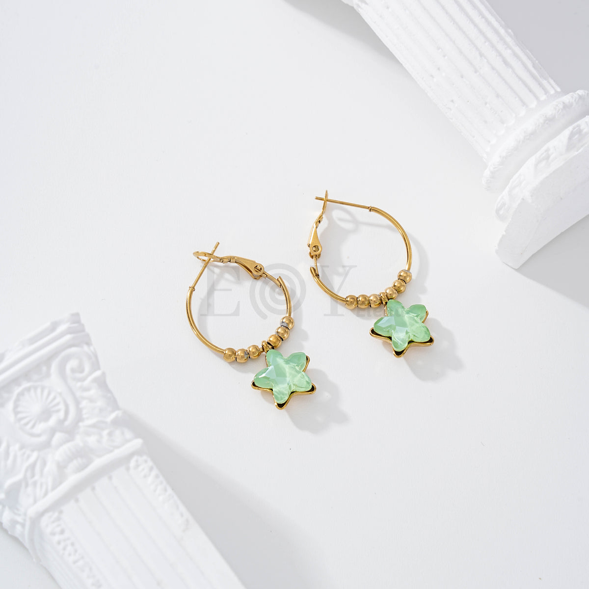 Pendientes aro con estrella piedra