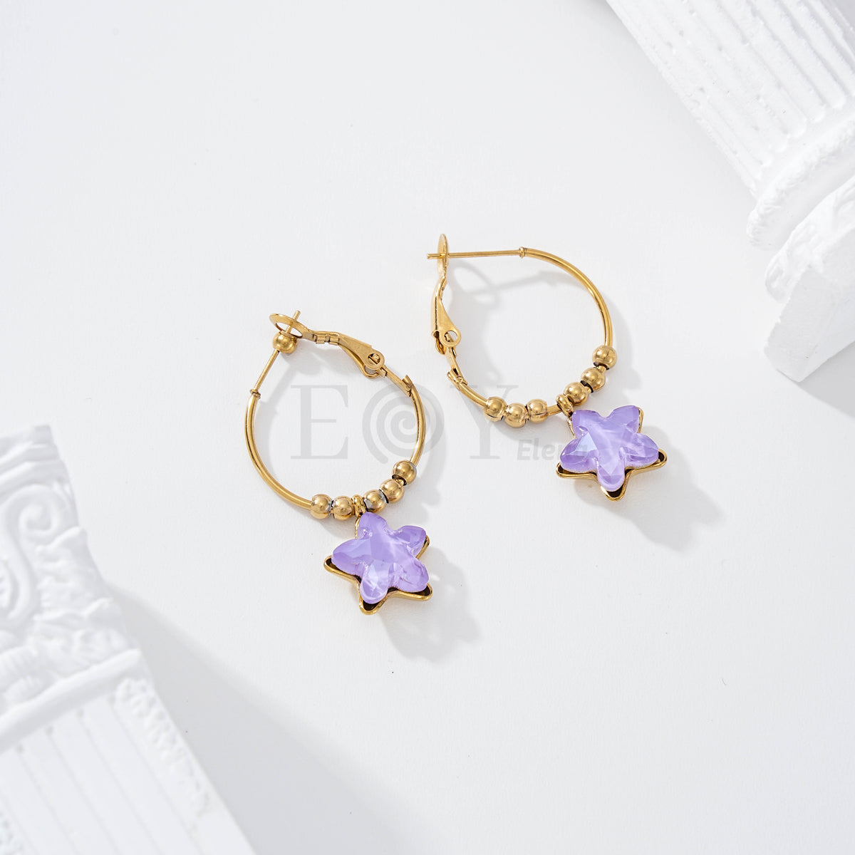 Pendientes aro con estrella piedra