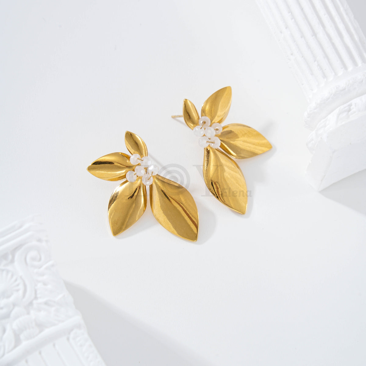 Pendientes media flor con piedras