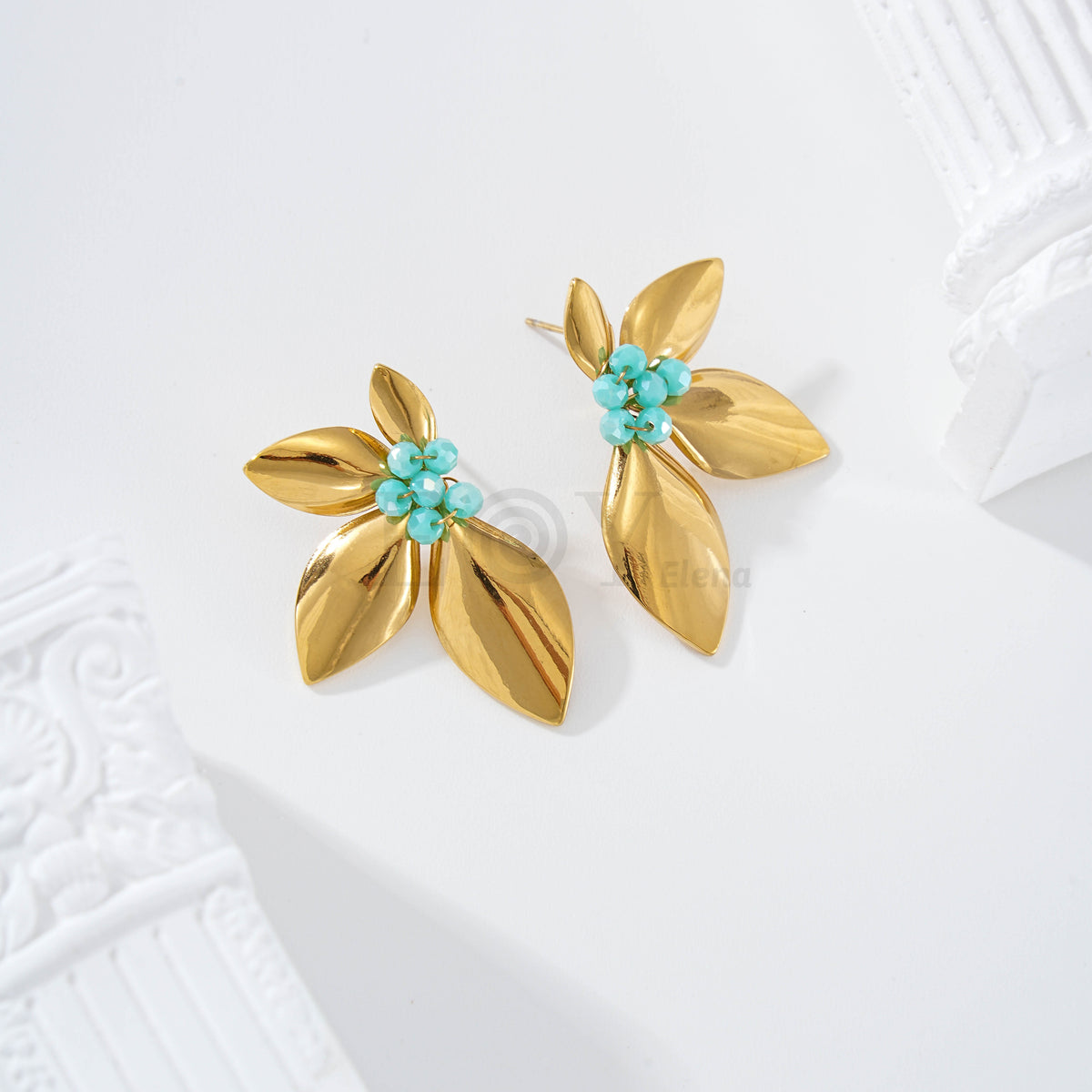 Pendientes media flor con piedras