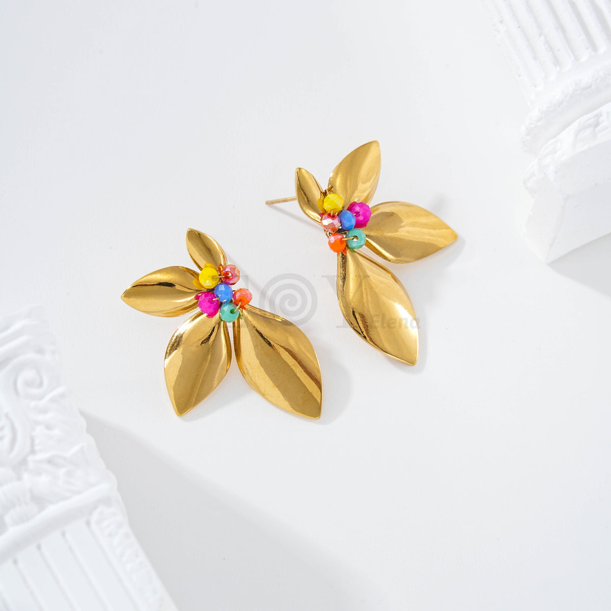 Pendientes media flor con piedras
