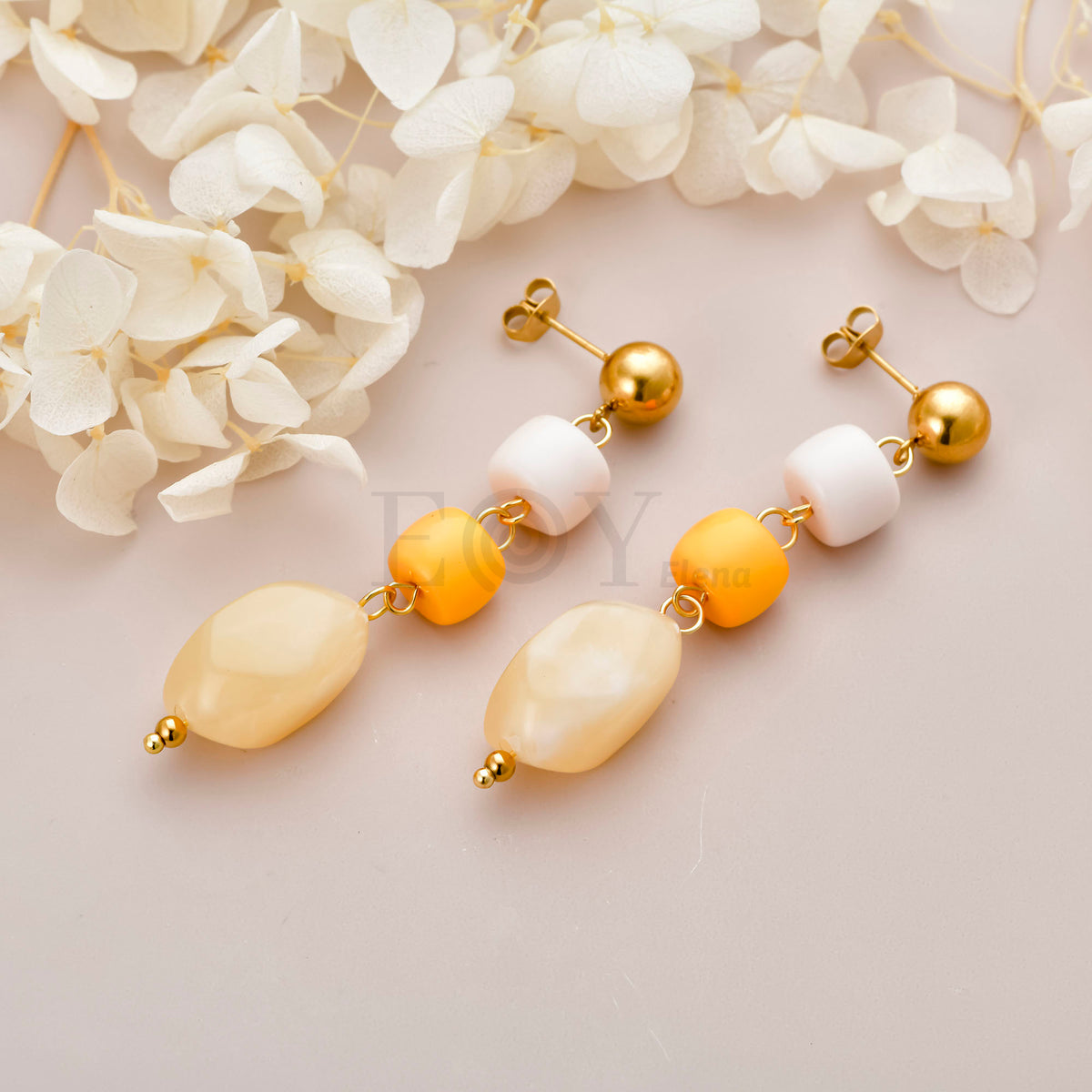 Pendientes triple piedra colgante