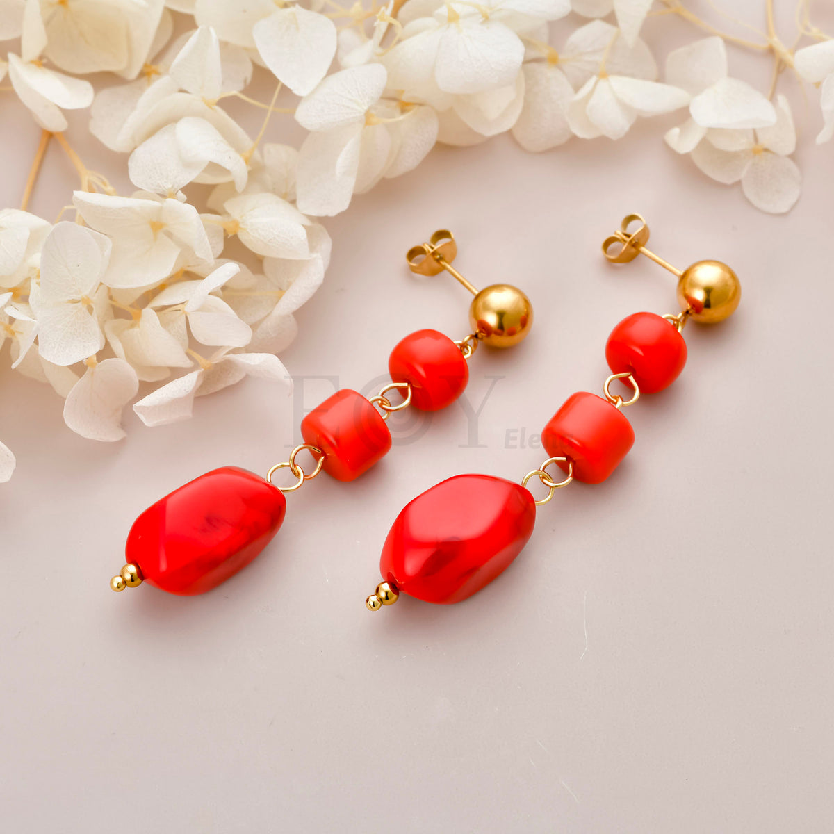 Pendientes triple piedra colgante