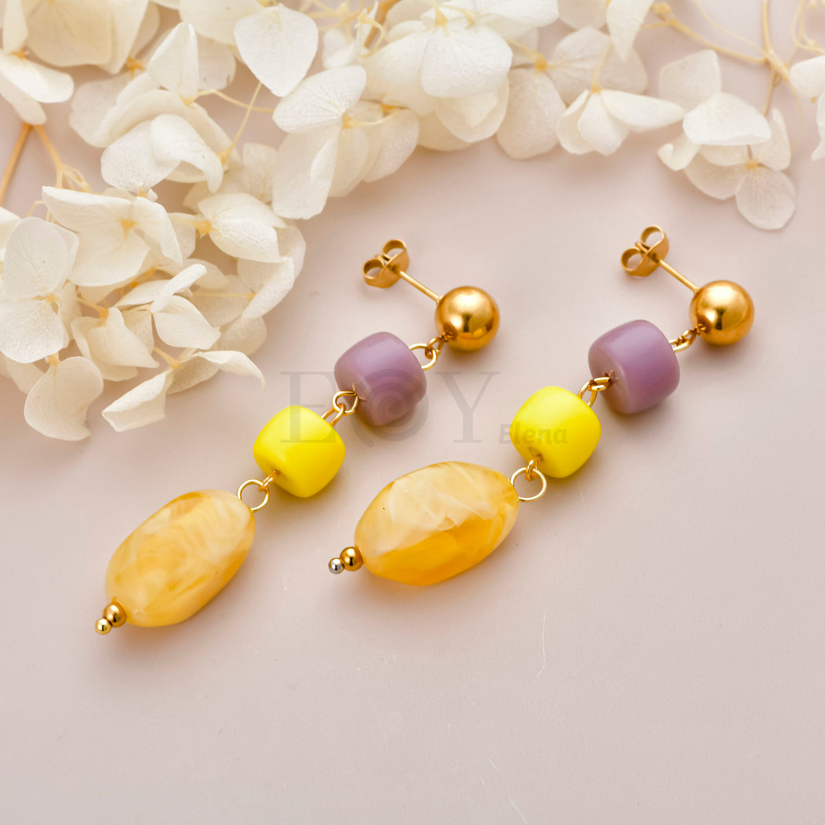 Pendientes triple piedra colgante
