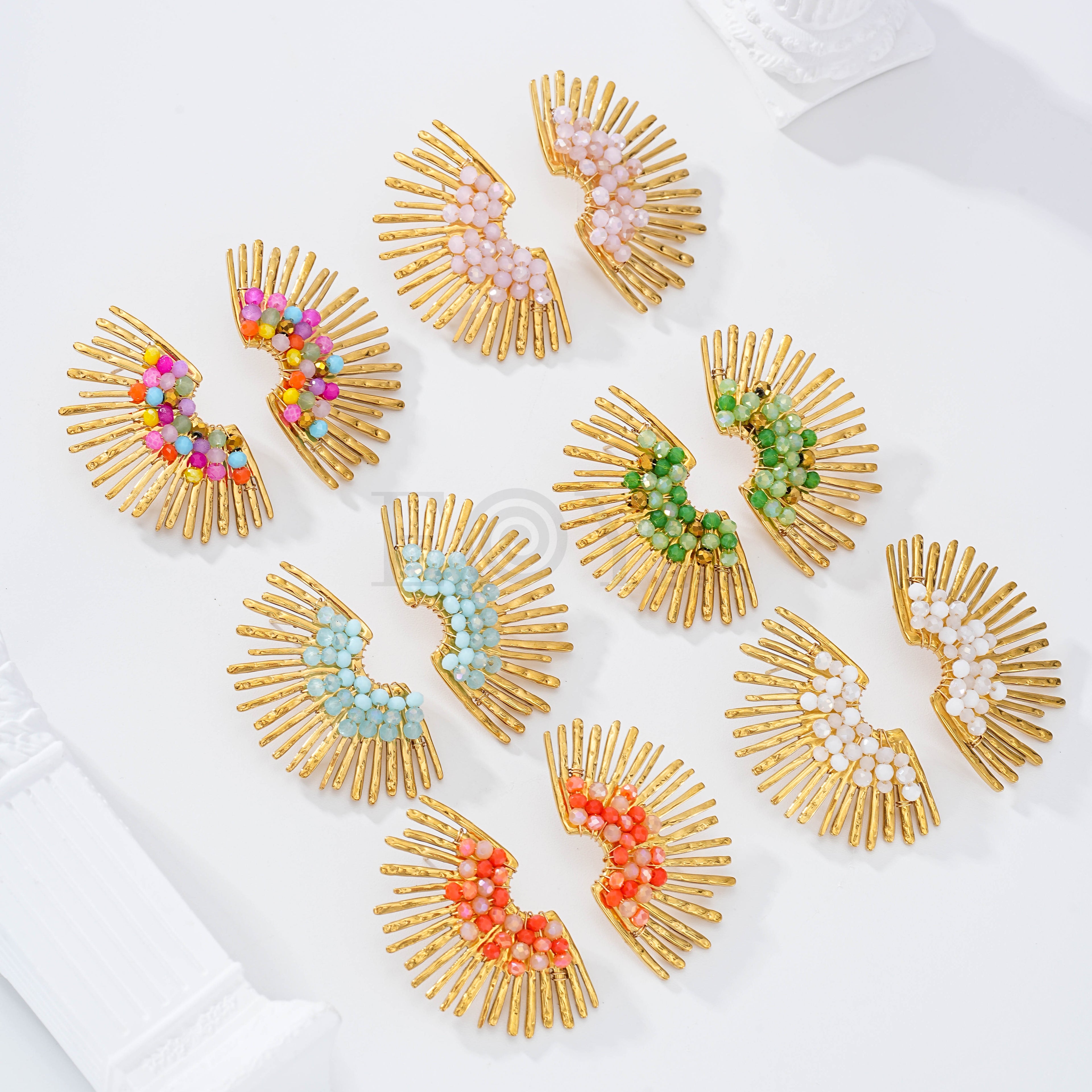 Pendientes medio sol con piedras colores